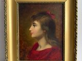portrait d'une jeune fille en robe rouge dans un cadre doré