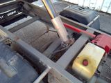 a truck that has a gas can in the back of it