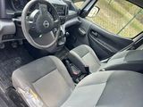 a picture of the interior of a car with a steering wheel