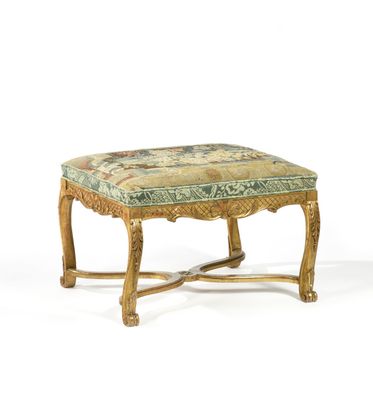 an image of a wooden bench with a floral upholstered seat