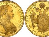 a gold coin with a picture of a man and a bird on it