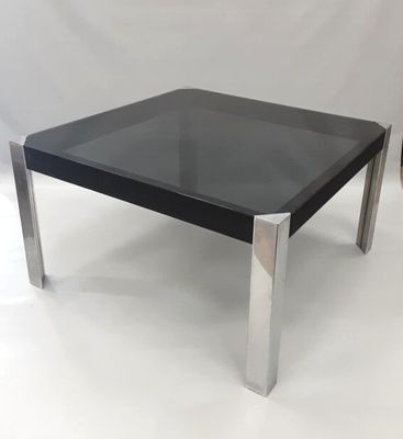 Guido Faleschini attribué à : Table à piètement inox et plat…