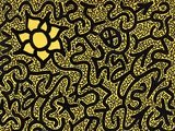 un motif noir et jaune avec un soleil au centre