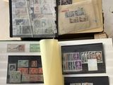 a lot of stamps on the pages of a book