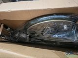 a box with a bicycle inside of it on the ground
