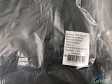a plastic bag with a label on it sitting on a table