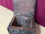 a small wooden box that is sitting on a table
