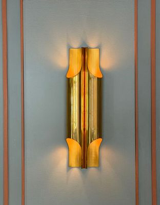 a wall light that is on the wall of a room