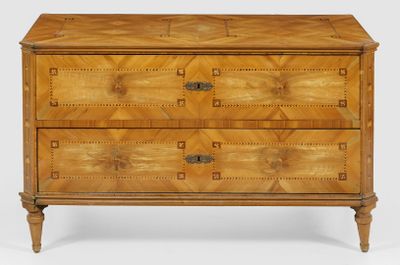 a wooden chest of drawers with two drawers on each side