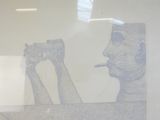 a drawing of a man holding a gun and smoking a cigarette