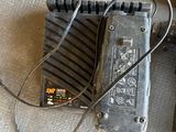 a cell phone that is connected to a charger