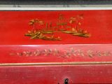 a red box with a picture of a pagoda on it