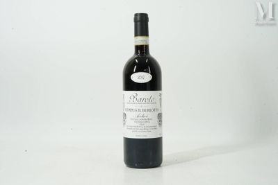 a bottle of wine that is sitting on a table