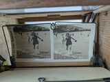 a picture of a couple of people on a surfboard
