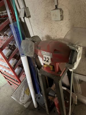 an image of a garage with a lot of tools in it