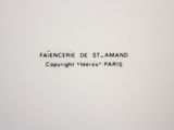 a close up of a white plate with black writing on it