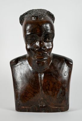 Travail FRANÇAIS Sculpture en bois teinté figurant un visage…