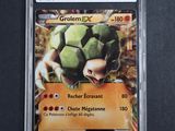 a close up of a card in a plastic case on a table