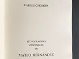 an open book with a black and white cover on a table