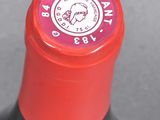 a close up of a bottle of wine on a table