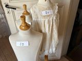 two mannequins that are on display in a room