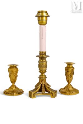 three candles that are sitting next to each other