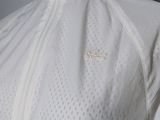 a close up of a white jacket on a mannequin mannequin