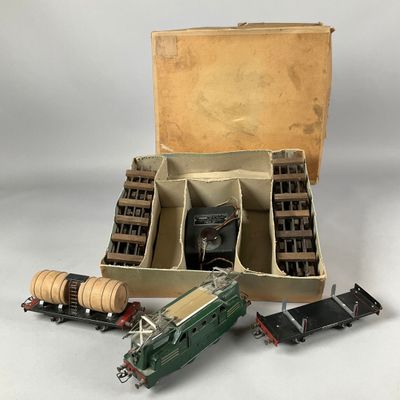 a box with a train engine and other toy trains