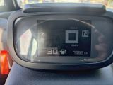 a digital display on the dashboard of a car