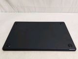 an image of a black plastic plate on a white surface