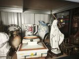 a shelf with a statue of a woman on it