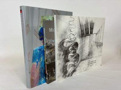 two books that are sitting next to each other on a table