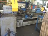 a machine that is sitting in a room with a lot of wood