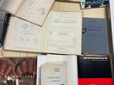 many books on the table with a lot of them