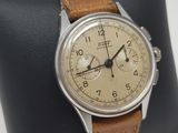 an image of a close up of a wrist watch on a pillow