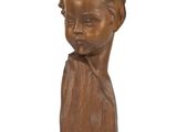 wooden sculpture of a child ' s head on a white background