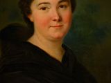 portrait of a woman in a black cloak