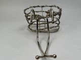 an image of a metal wire basket with two handles