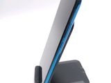 a cell phone that is sitting on top of a stand