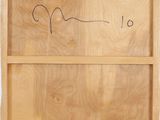 an image of a picture of a wooden box with writing on it