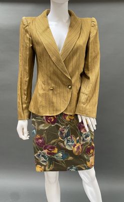 an image of a mannequin wearing a yellow jacket and skirt