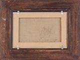 an old picture frame with a picture of a dog in it