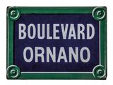 an old blue and green street sign with the word boulevard ornano on it