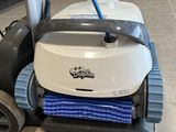 the robotic cleaning machine is sitting on the floor in the room