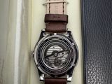 a watch that is sitting in a box on the table