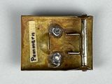 a small metal box with some screws on it