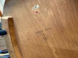 a close up of a piece of wood that has been turned into a skateboard