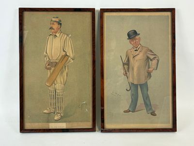 pair of two framed pictures of a man in a top hat and a man in a top hat holding a bat