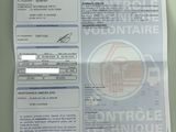 a receipt with a picture of a house on it