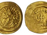 une pièce d'or portant l'image d'un homme et d'une femme